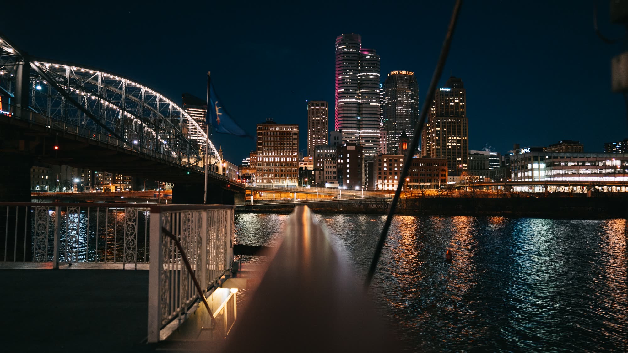 The Pittsburgh skyline at night from the deck of a Gateway Clipper riverboat