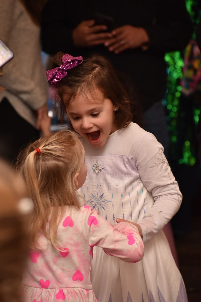 Two excited little girls at a kids’ cruise