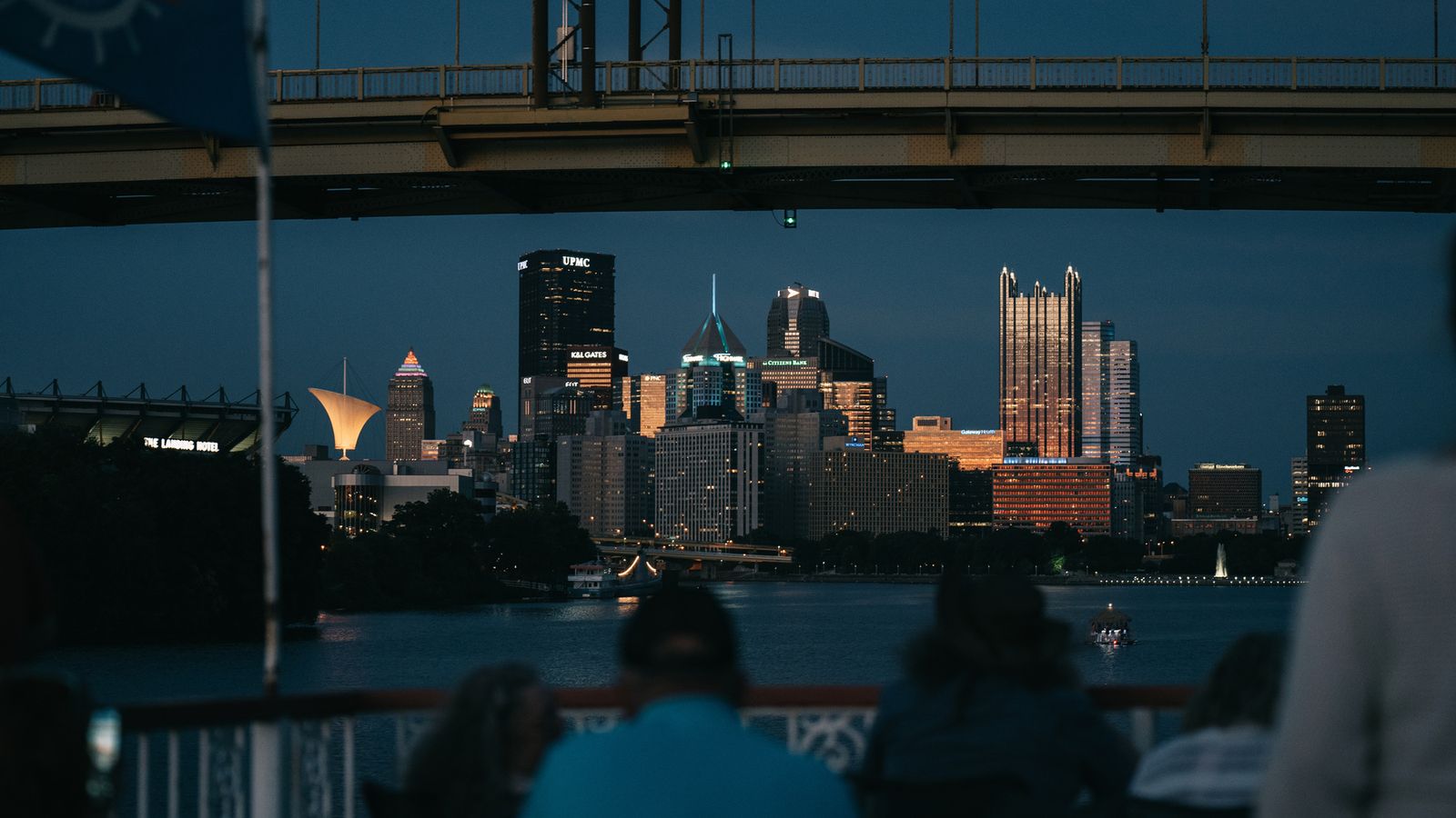 The downtown Pittsburgh skyline at dusk seen from a riverboat