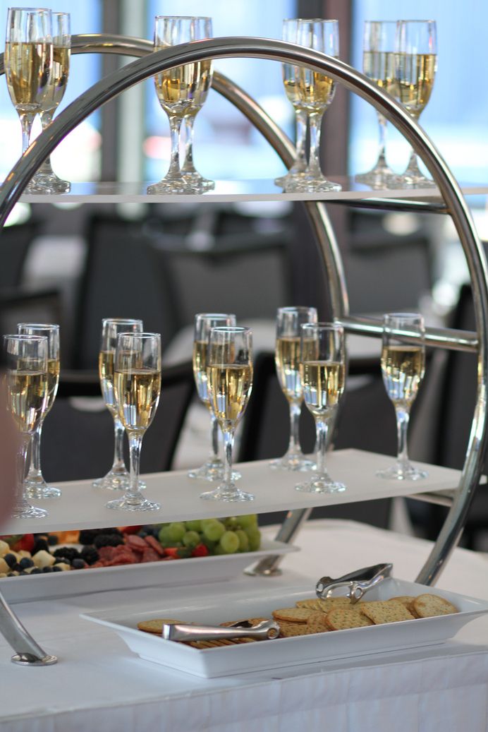 Glasses of champagne on a tiered stand