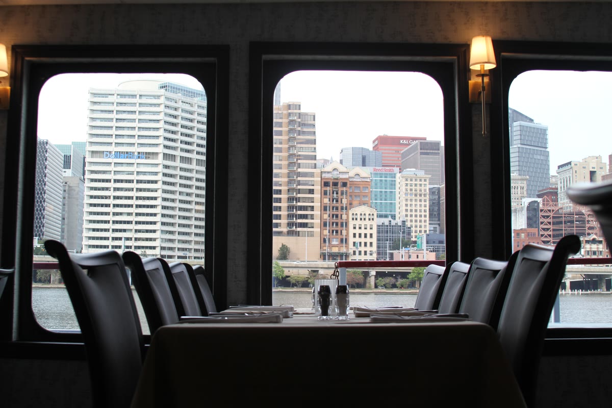 The Princess dining room with the downtown skyline through the windows