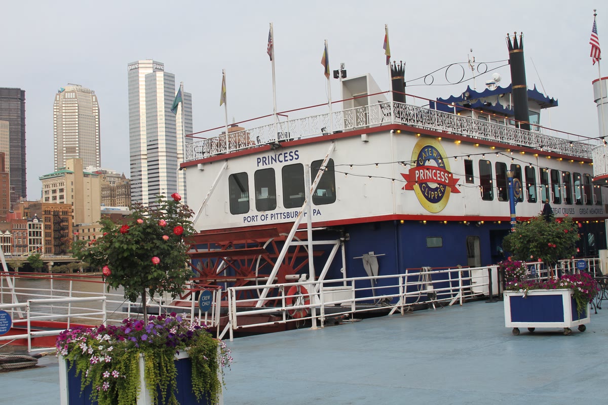 The Princess at the dock with the skyline behind