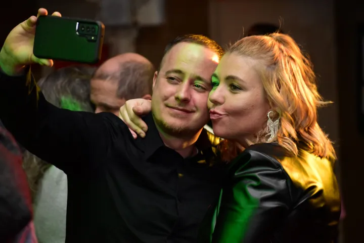 a man standing in front of a crowd