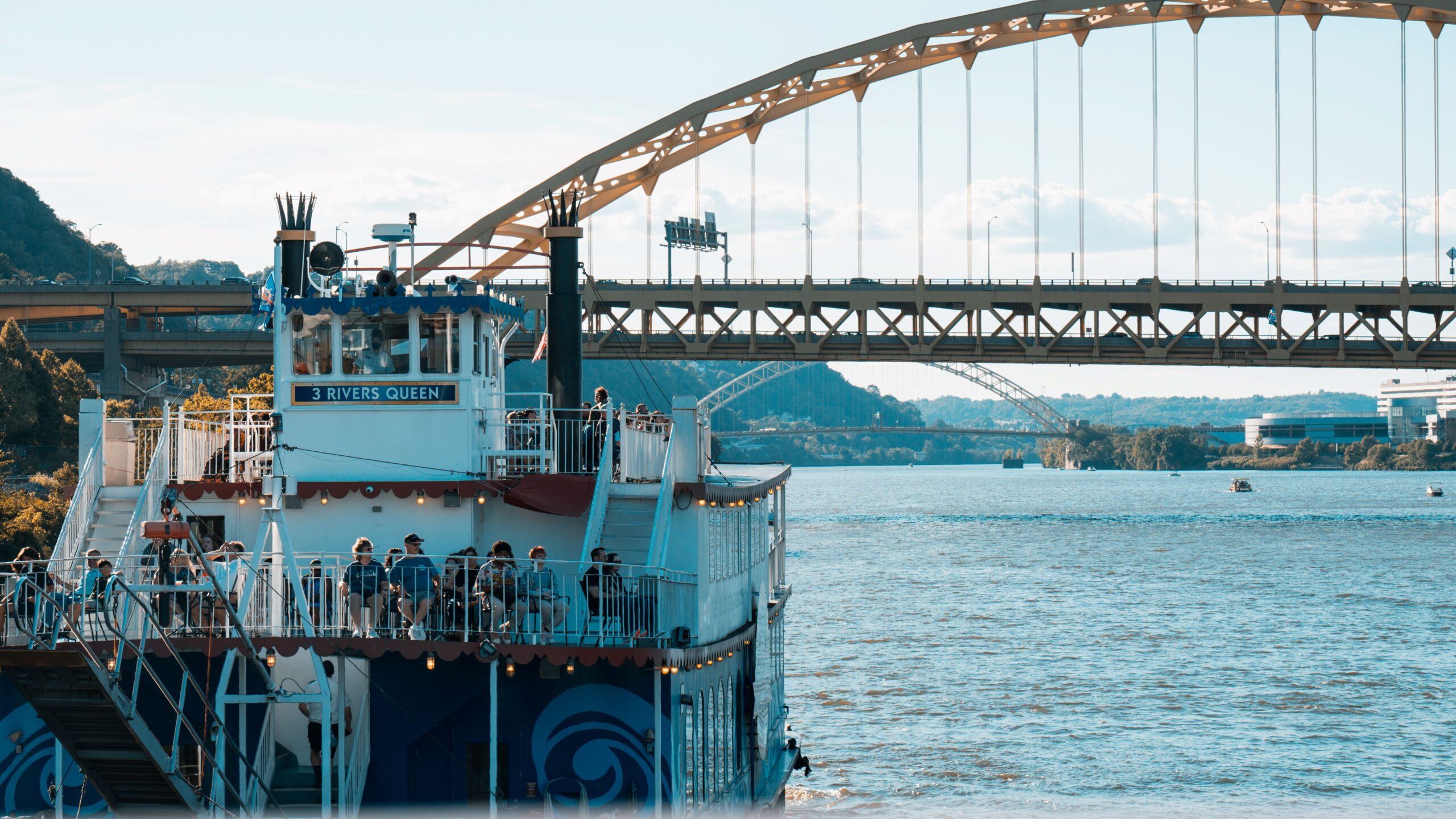 a train crossing a bridge over water